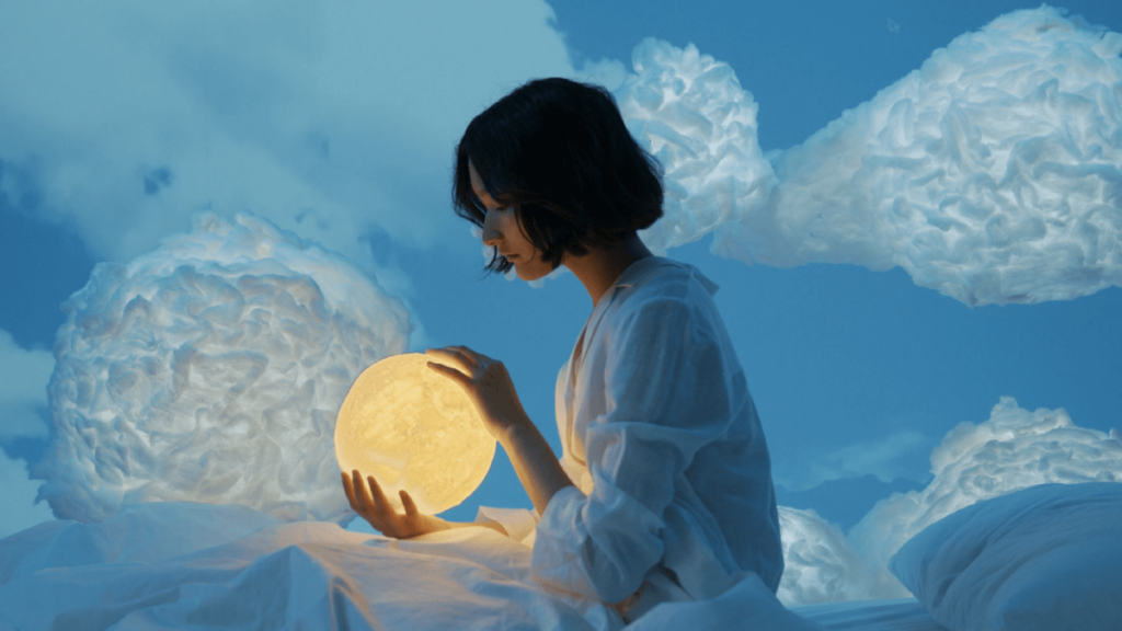 girl holding the moon